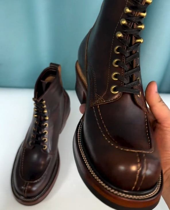 Brown hand-stitched high-top boots