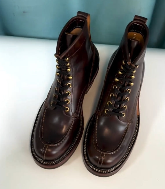 Brown hand-stitched high-top boots