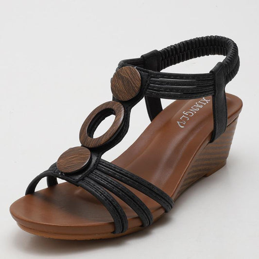 Wedge-heeled Roman sandals with thick soles