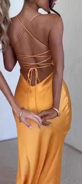 Stylish sexy orange skirt with suspenders