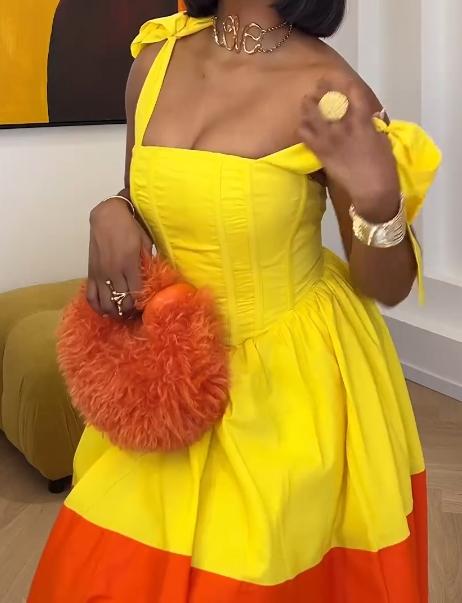 Yellow-orange color matching bow sling dress